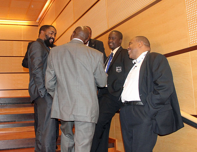 Lewis Ncube (right) talking with African delegates.