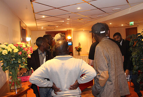 FIDE’s Israel Gelfer with African players and delegates outside meeting room after two factions formed.
