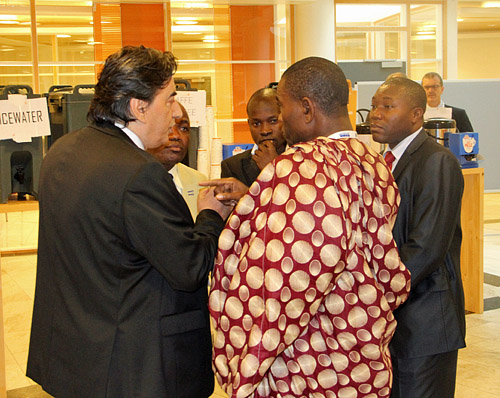 Georgios Makropoulos in a shouting match with the Ivory Coast’s Dr. Essoh Essis during a coffee break of the 2014 FIDE Congress. Here’s part of the exchange. 4:13 minutes. Photo by Daaim Shabazz.