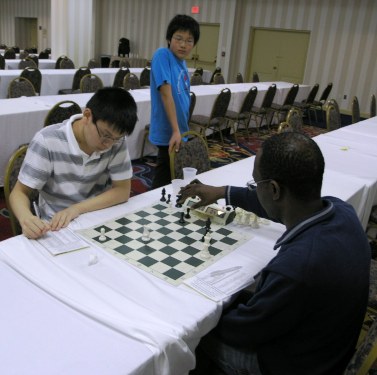 Christopher Heung vs. Kenneth Odeh. Photo by Daaim Shabazz.