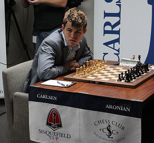 Magnus Carlsen wins longest world championship game ever to seize advantage  - ESPN