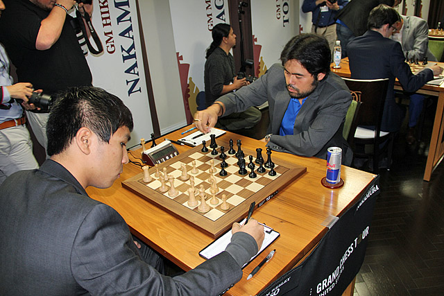 With his ubiquitous Red Bull drink nearby, Nakamura plays Ne7 in what became a game to remember! Photo by Daaim Shabazz.