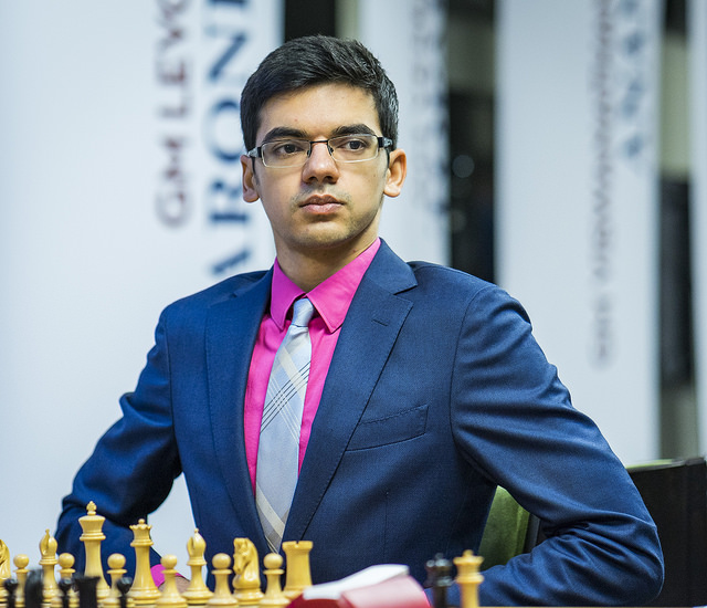 Anish Giri got compliments on his suit, but his play didn't match. Svidler got the win.