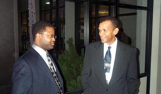 GM Maurice Ashley and IM-elect Stephen Muhammad conversing after having successfully completed the U.S. Chess Championship. Copyright  2003, Daaim Shabazz.