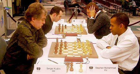 GM Sergey Kudrin vs. FM Stephen Muhammad. Copyright © 2003, Jerry Bibuld.
