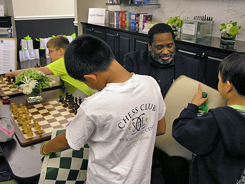 Local legend Charles Lawton interacting with kids. Photo by Daaim Shabazz.