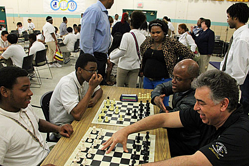 GMs Yasser Seirawan and Maurice Ashley trying to defend their honor against all takers.