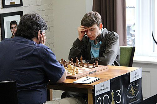 GM Conrad Holt, a sophomore physics major at University of Texas-Dallas, took an online final during the tournament. Fortunately, he still had a stellar event.