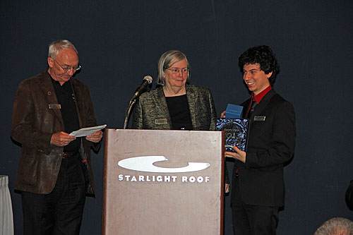 GM Alejandro Ramirez receives prize from Rex and Jeannie Sinquefield.