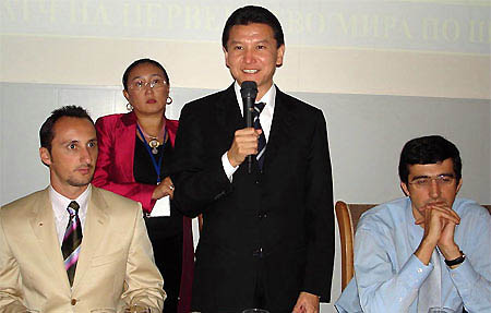 FIDE President Kirsan Ilymzhinov with FIDE Champion Veselin Topalov (left) and Classical Champion Vladimir Kramnik (right). Ilyumzhinovs executive assistant stands in the background.