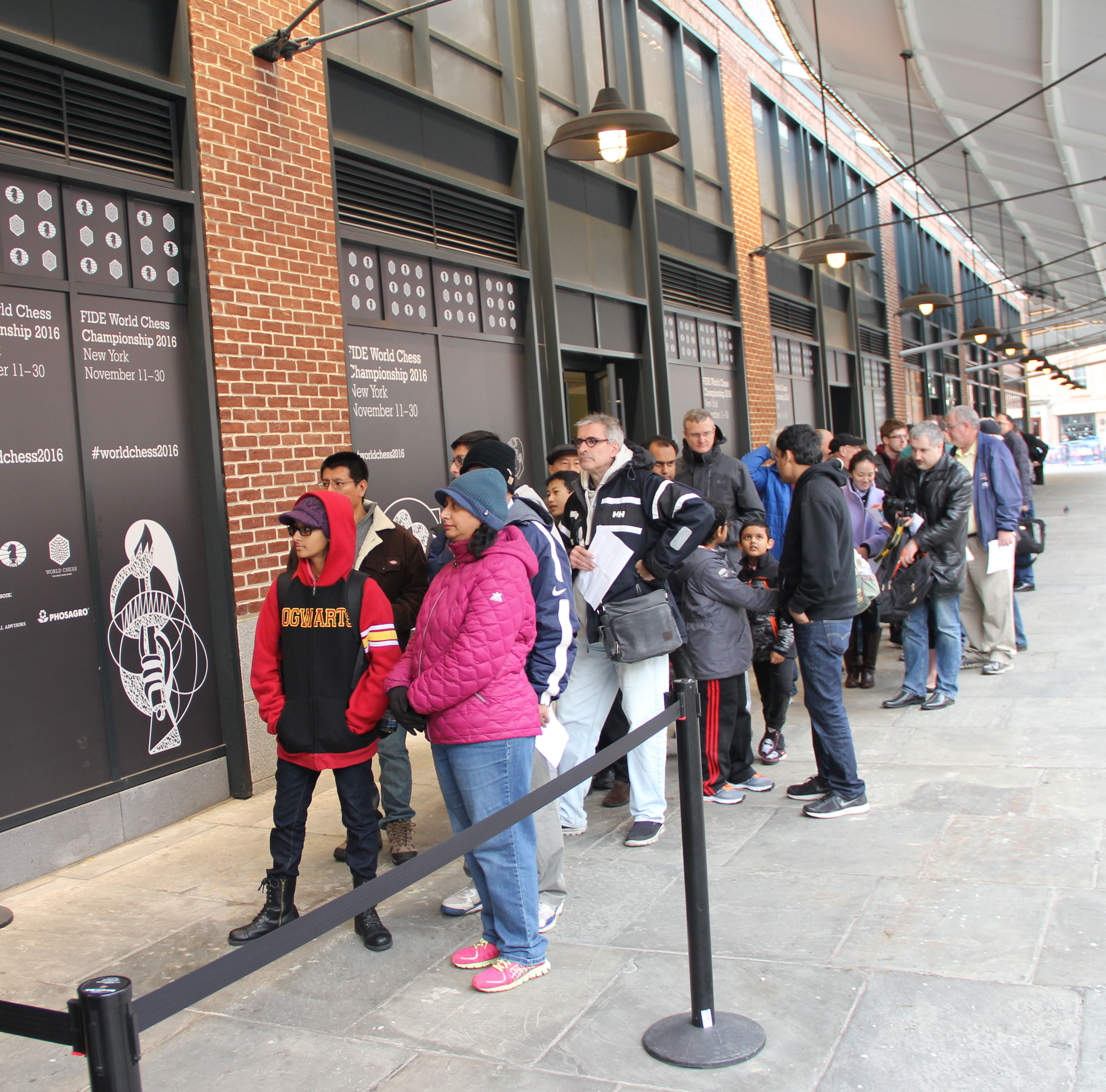 Crowds queues up for the 10th game of championship match. Photo by Daaim Shabazz.