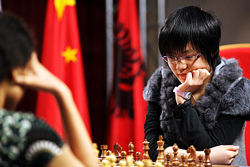 Hou Yifan took advantage of her opponent's shortage of time. Photo by Anastasiya Karlovich for FIDE.