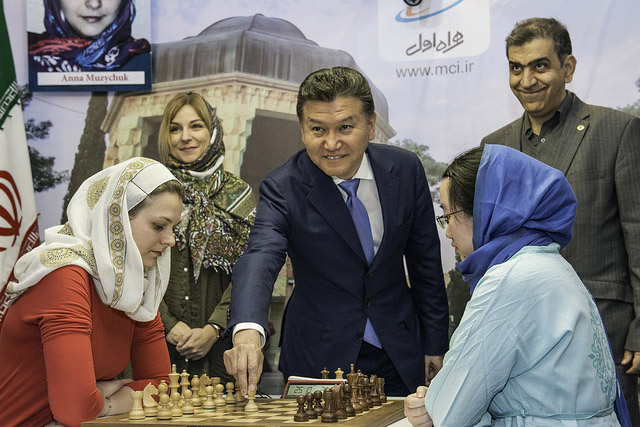 Kirsan Ilyumzhinov making ceremonial move in World Women's Championship final. Photo by David Llada.