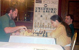 GM Ilya Smirin vs. IM Alexandra Kosteniuk. Copyright  2003, Daaim Shabazz.