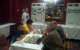 Akobian-Wojtkiewicz (foreground), Nakamura-Shabalov (background). Copyright  2004, Daaim Shabazz.