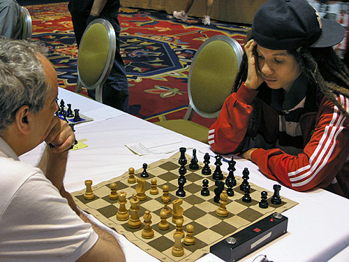 Kassa Korley playing GM Dmitri Gurevich. Photo by Daaim Shabazz.