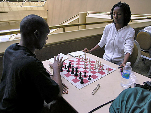 Daaim Shabazz analyzing with Darrian Robinson after their game in round #8. Photo by Daaim Shabazz.