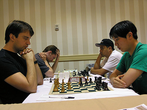 Alexander Stripunksy vs. Canada's FM Bindi Cheng (1-0). Photo by Daaim Shabazz.