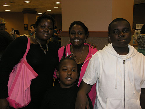 Justus Williams' fan club: Latisha Williams (mother), Pamela Ballard (grandmother), Jacob Williams (brother) and Justus Williams. Photo by Daaim Shabazz.