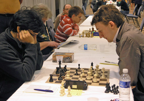 GM Pentala Harikrishna in a battle against GM Luke McShane. Photo by Daaim Shabazz.