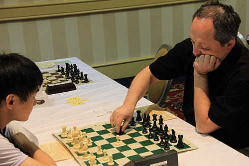 IM Quignan Liu vs. GM Ilya Smirin, 1/2. Photo by Daaim Shabazz.