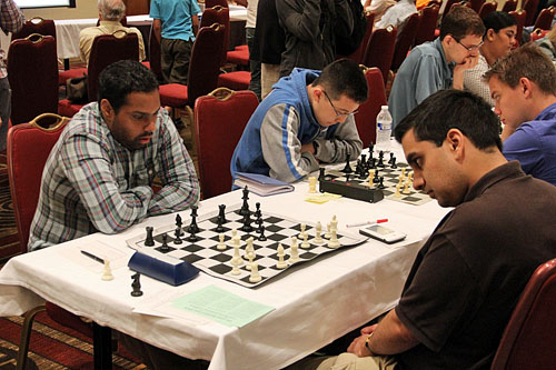 FM Kazim Gulamali vs. IM Justin Sarkar. Photo by Daaim Shabazz.