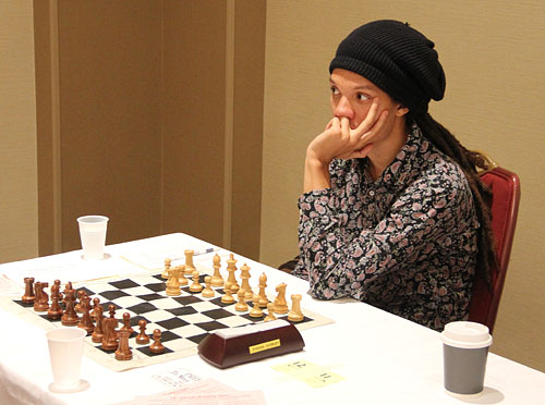 Korley getting ready for next round after drawing with GM Lazaro Bruzon with the Alekhine! Photo by Daaim Shabazz.