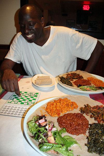 Mario Marshall enjoyed his first taste of Ethiopian. Photo by Daaim Shabazz.